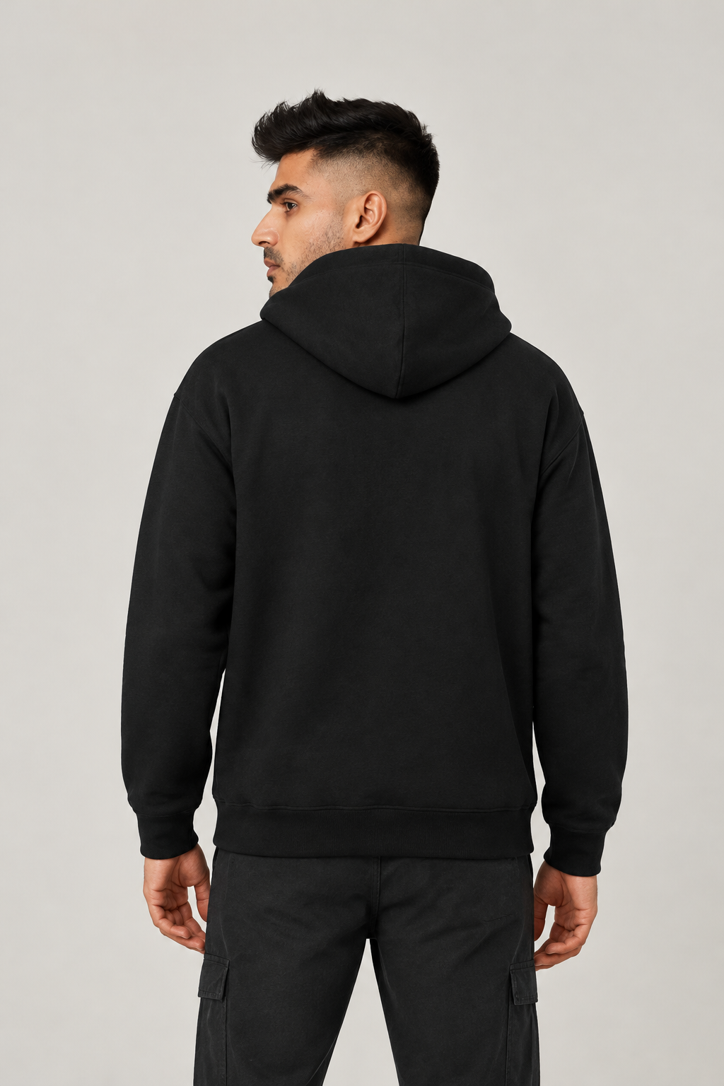 Black hoodie का back pose